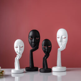 Woman with Face in Hand Statue